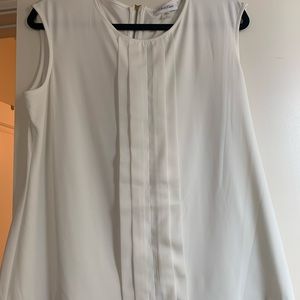 Calvin Klein Off white Sleeveless Top size LG with Gold accents.
